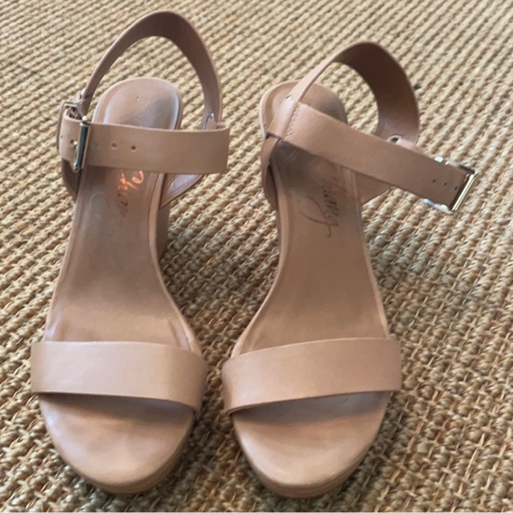 Tan wedge heel with gold buckle